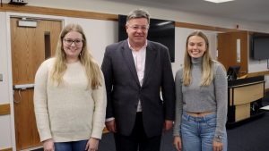 A photo of Abby Thibodeau and Sara Economy with Ivan Manev